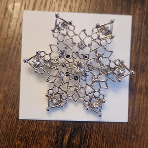 Elegant Silver Snowflake Brooch With Clear Crystals